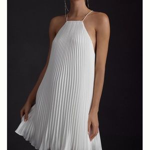 NWT white mini dress tie back swing dress. Satin halter minidress pleated